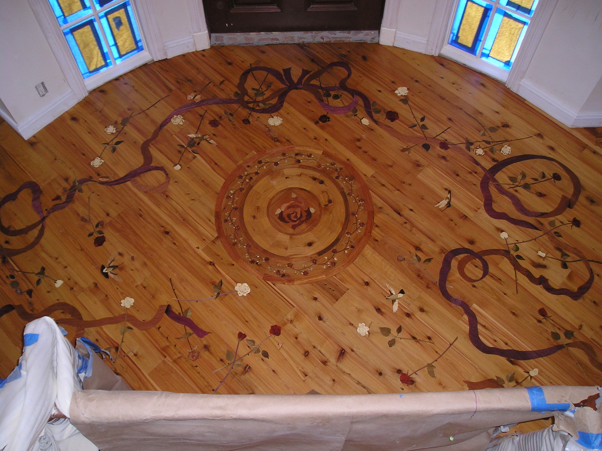 Intricate custom parquet wood floor demonstrating Endurance Floor Company craftsmanship