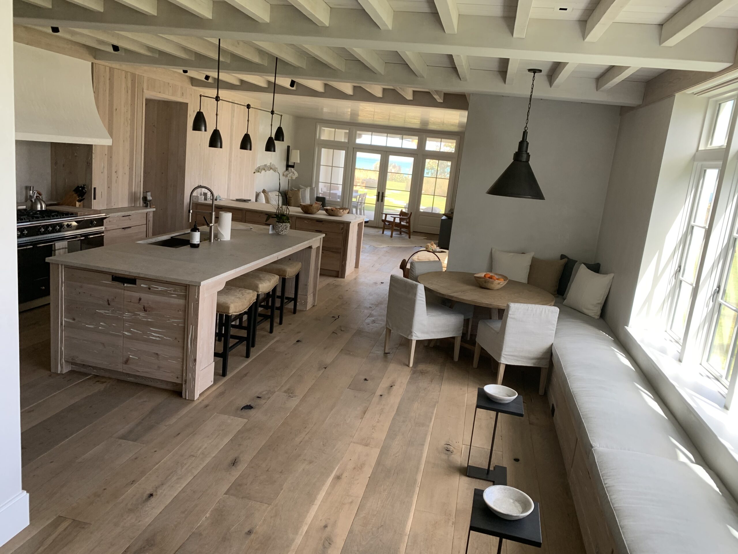 Light wide plank hardwood floor installed in a South Florida home